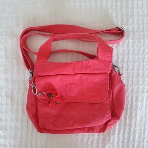 vibrant pink kipling bag